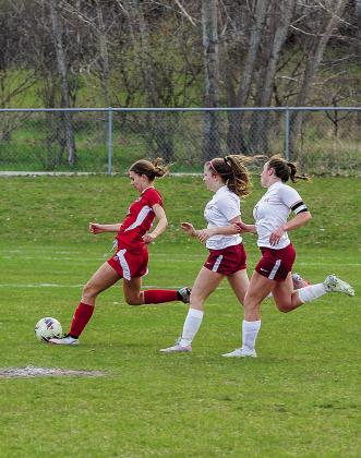 Suttons Bay sophomore Megan U’Ren score the Norse lone goal against Charlevoix on Monday in a 3-1 loss.