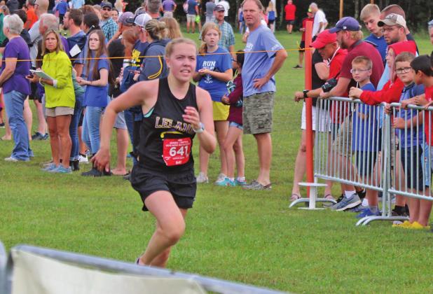 Leland junior cross country runner Bridgette Duncan competes at the Pete Moss Invitational at Benzie Central High School last week. Enterprise photo by Brian Freiberger