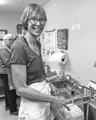Lynne Brach of Suttons Bay enjoys helping to feed Leelanau County and Traverse City.