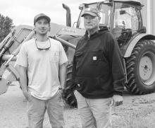 Father and son, Dan (right) and Alex (left), of Empire Trellis are continuing the dream located right from the family farm in Empire Township. Enterprise photo by Brian Freiberger